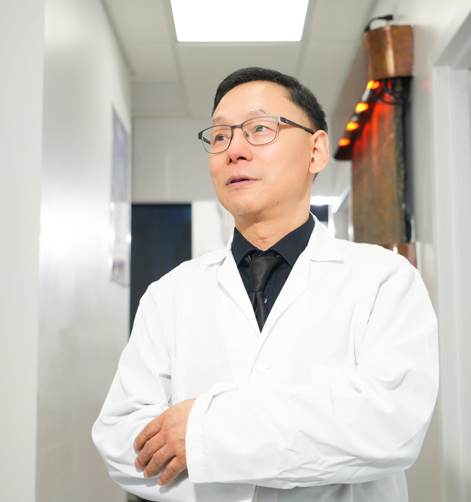 Dr. John Shi, DDS - founder and implant expert at Centre Dental NYC